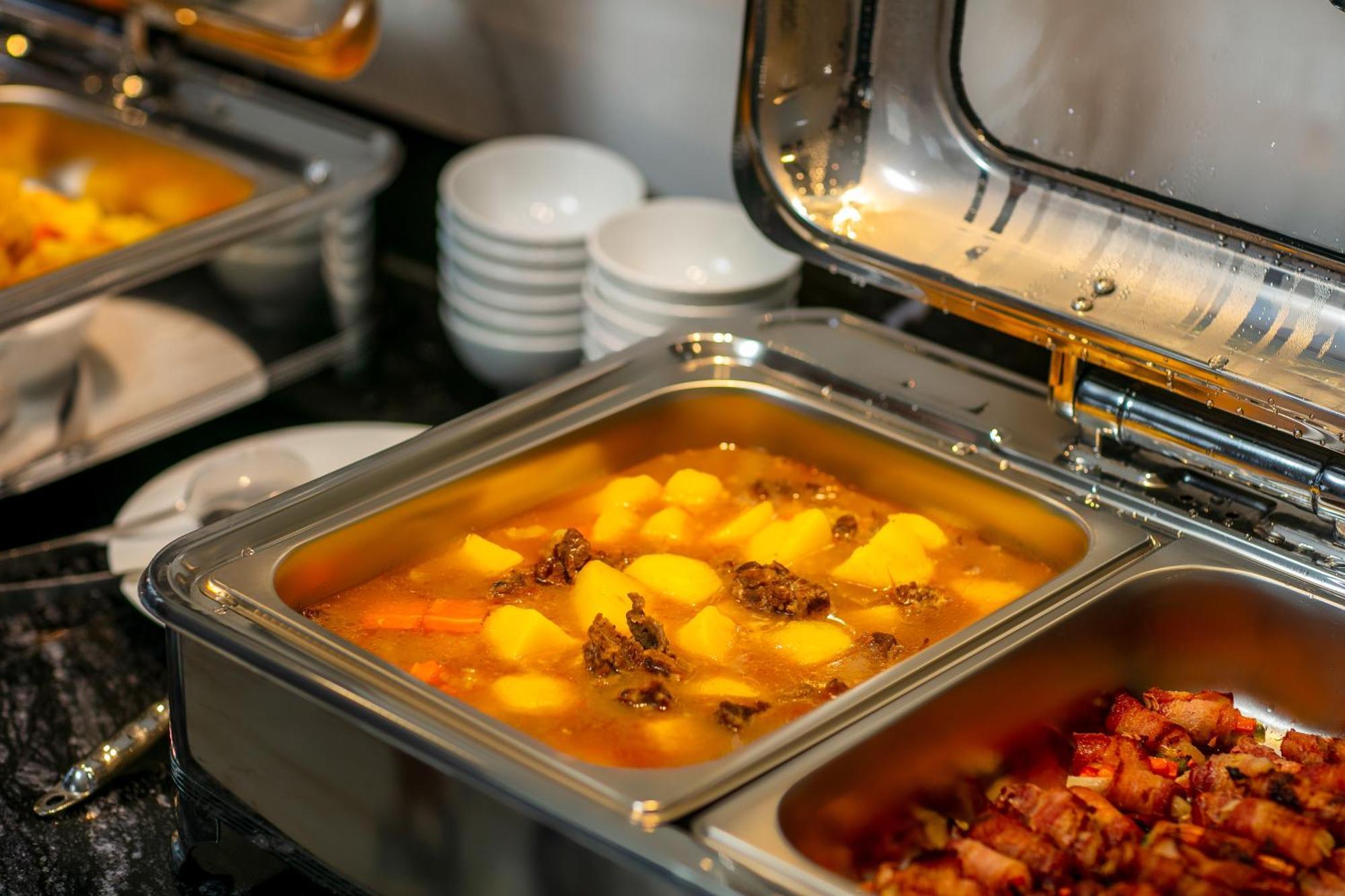 May De Ville Lakeside Hotel Hanoi Exterior photo A chafing dish